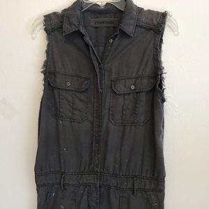 Etienne Marcel destroyed jumpsuit, paint splashes.